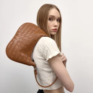 Chic Woven Leather Backpack In Saddle Brown